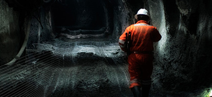 Mining - miner in tunnel